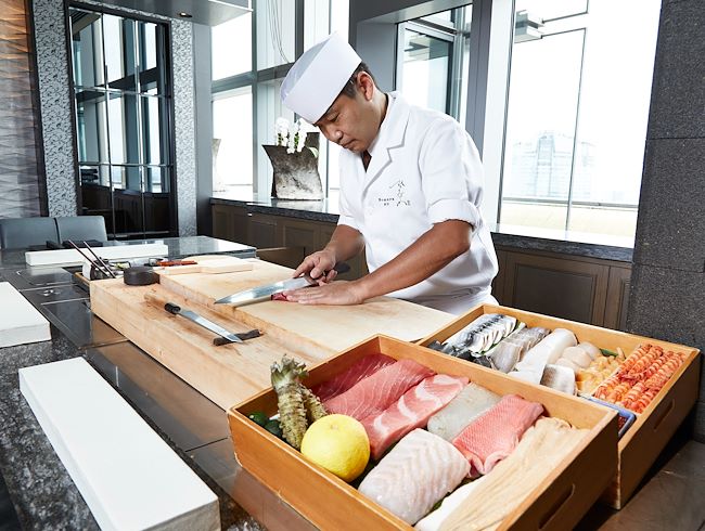 https://hinokizaka.ritzcarltontokyo.com/en/resourcefiles/snippet-image/sushi-chef-nomura-1.jpg